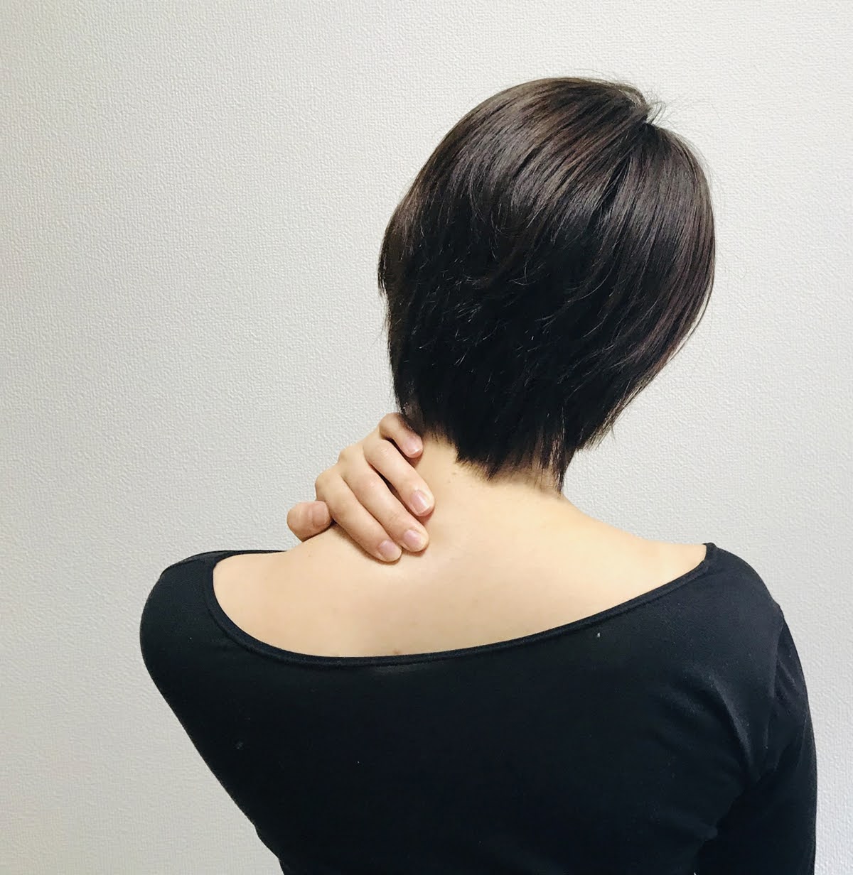 患者首痛み